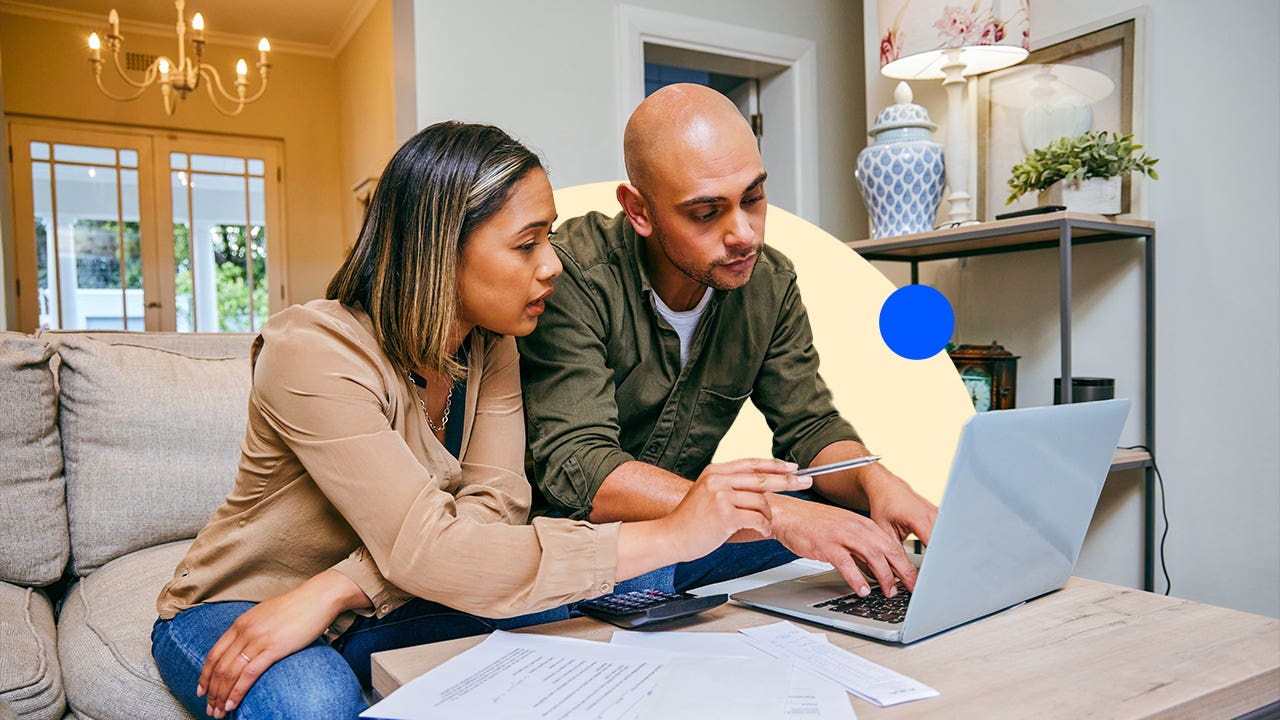 Person comparing finance options on a laptop, deciding between broker and bank